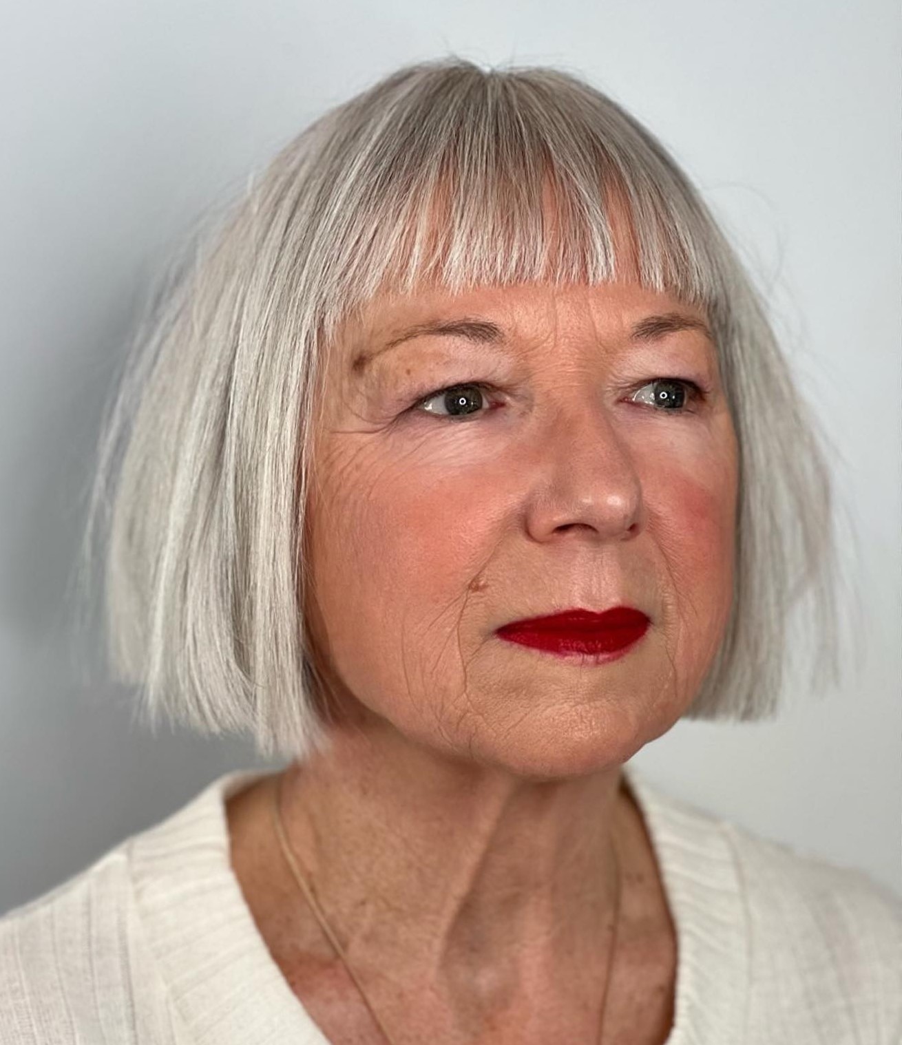 Blunt Silver Bob with Straight Across Bangs